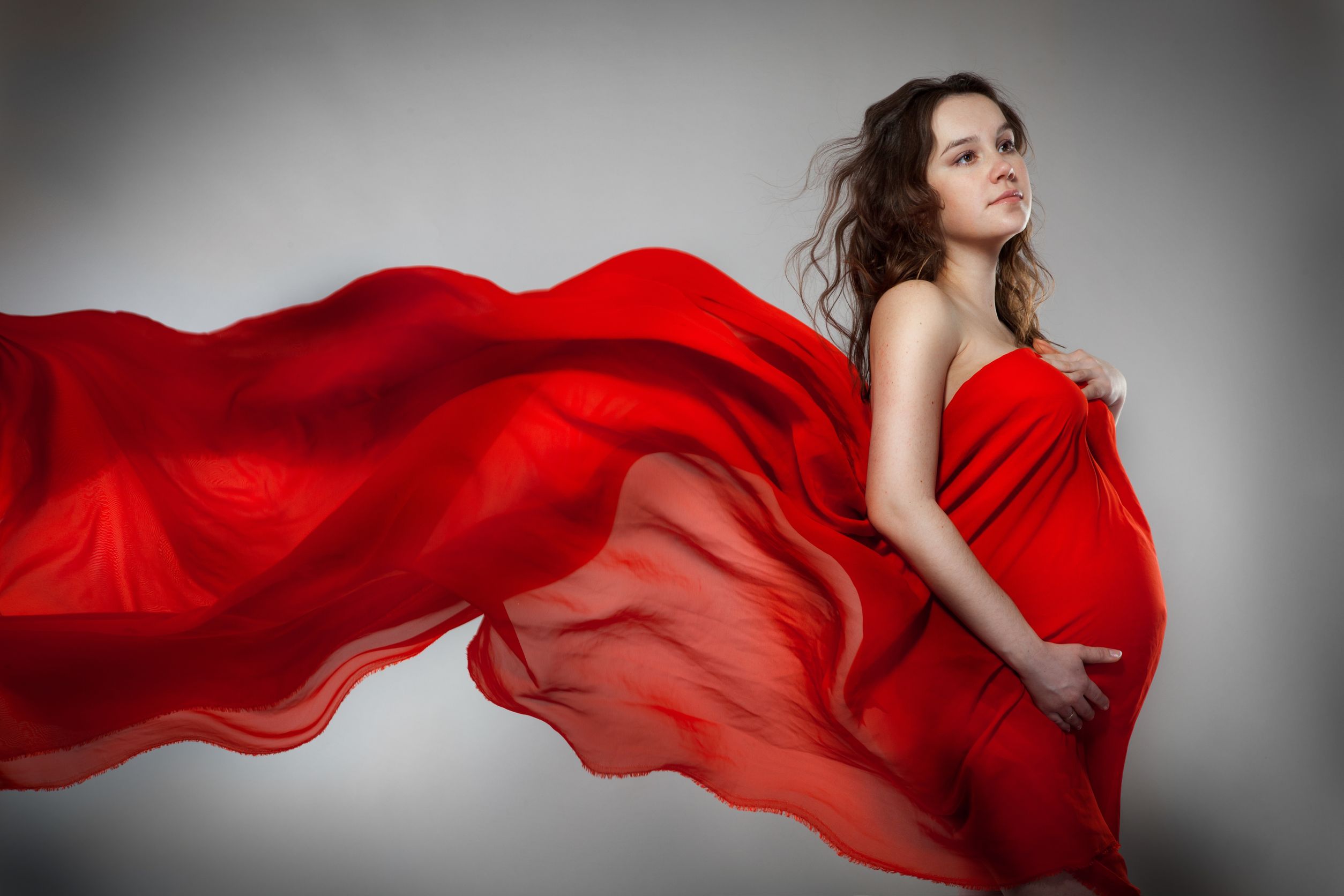 Очень красивые беременные. Красивая беременна яженшина. Женщина в Красном платье.